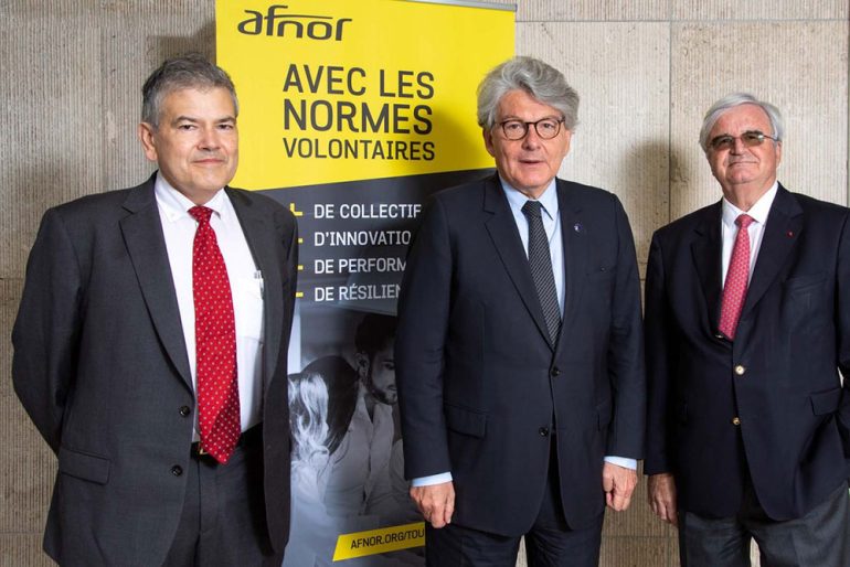 Marc Ventre, Chairman of AFNOR (right), and Olivier Peyrat, Director General (left), flanking Thierry Breton, European Commissioner, who attended the morning session of AFNOR's General Assembly in Paris.